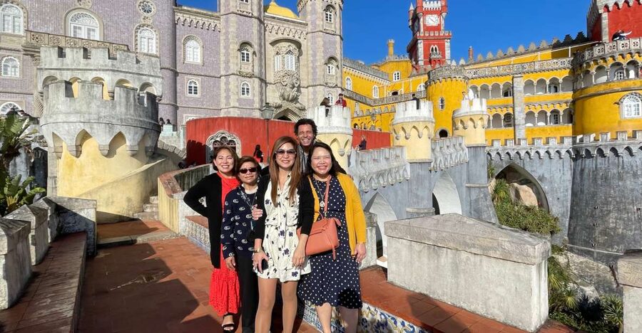 From Lisbon: Sintra, Cabo da Roca, Cascais, & Estoril Tour - Pena Palace: bold color, Romantic architecture, and ticket strategy