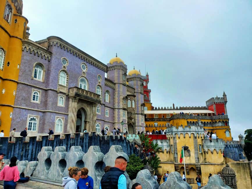 From Lisbon: Sintra, Pena Palace, Regaleira, Guided Day Tour - Castelo dos Mouros: Moorish Castle and the best kind of viewpoint fatigue