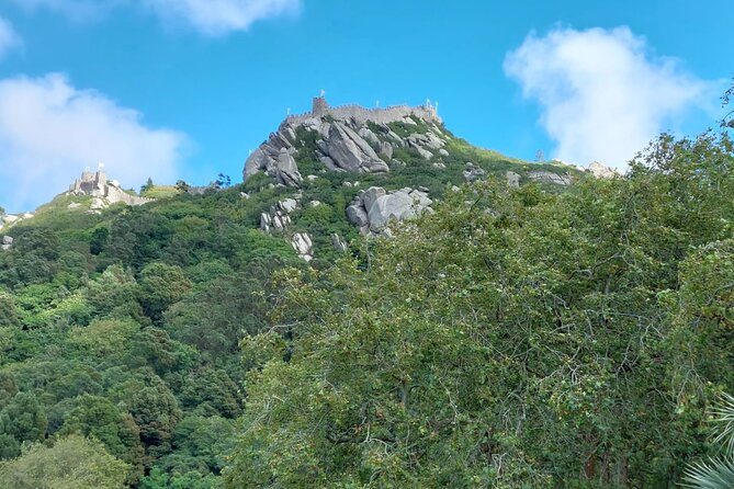 Private Tour Sintra, Palaces and Mountain Tuk Tuk(2 to 6 people) - Castle walls and the Moorish fortress story