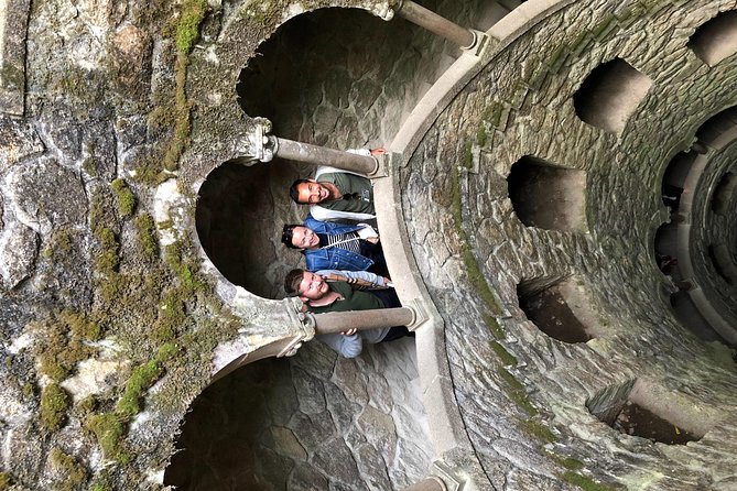 Sintra and Cascais with a Local Guide - Group tour starting from Sintra - Quinta da Regaleira: caves, towers, and symbolism you can ask about