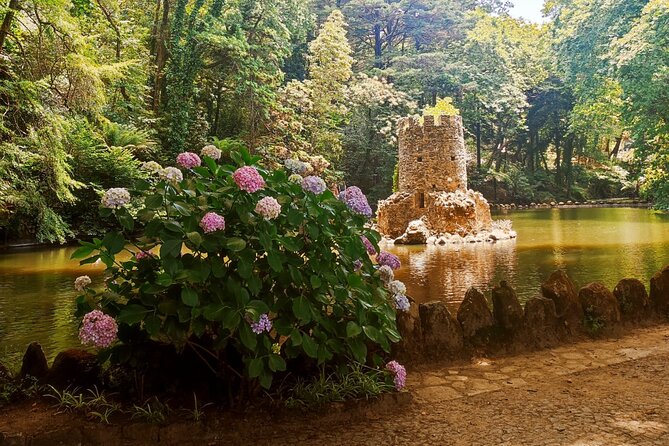 Sintra Private Hiking Adventure Tour - Estrada da Pena back down: palace sightlines during the descent
