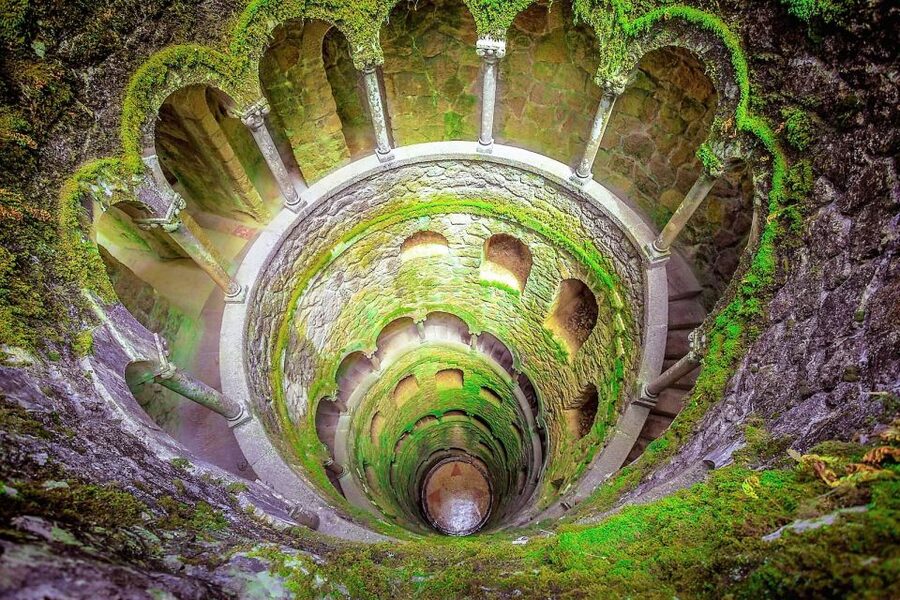 Sintra: Quinta da Regaleira Entry Ticket and Guided Tour - The Initiation Wells: stairs, landings, and Tarot-style symbolism